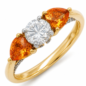 Canadian Diamond and Padparadscha Color Orange Sapphire Trilogy Style Ring in 18K Yellow Gold