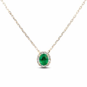 Emerald and Canadian Diamond Halo Pendant in Yellow Gold