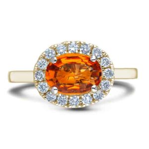 Canadian Diamond and Oval Orange Sapphire Halo Ring in Yellow Gold