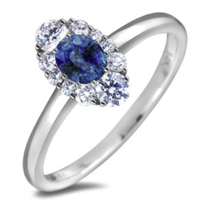 Oval Shape Sapphire and Canadian Diamond Accent Ring in White Gold