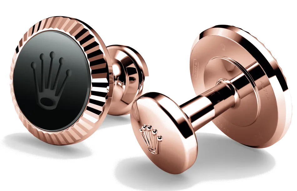 Rolex cufflinks made of 18 ct Everose gold featuring the signature Rolex fluting, Cerachrom insert and Rolex crown.