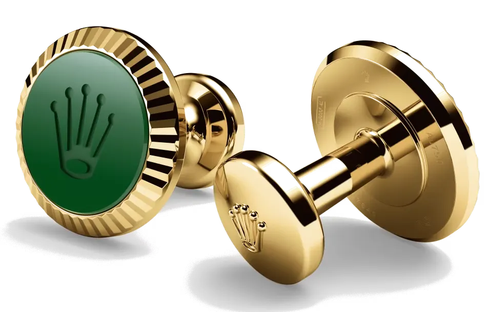 Rolex cufflinks made of 18 ct yellow gold featuring the signature Rolex fluting, Cerachrom insert and Rolex crown.