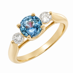 Round Cut 1.01 Carat Blue Sapphire and Canadian Diamond Three Stone Ring in Yellow Gold