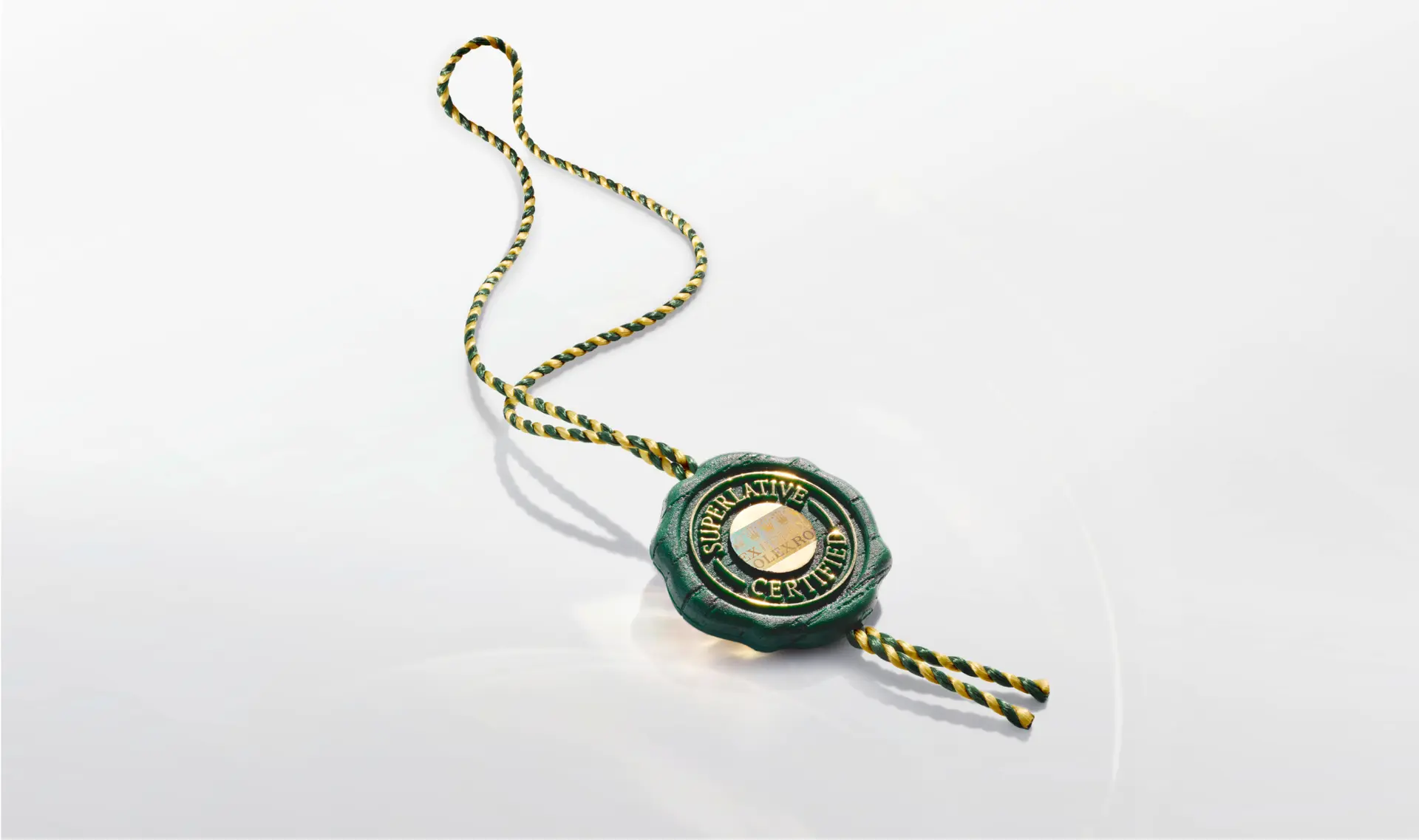 Rolex green seal emblem.