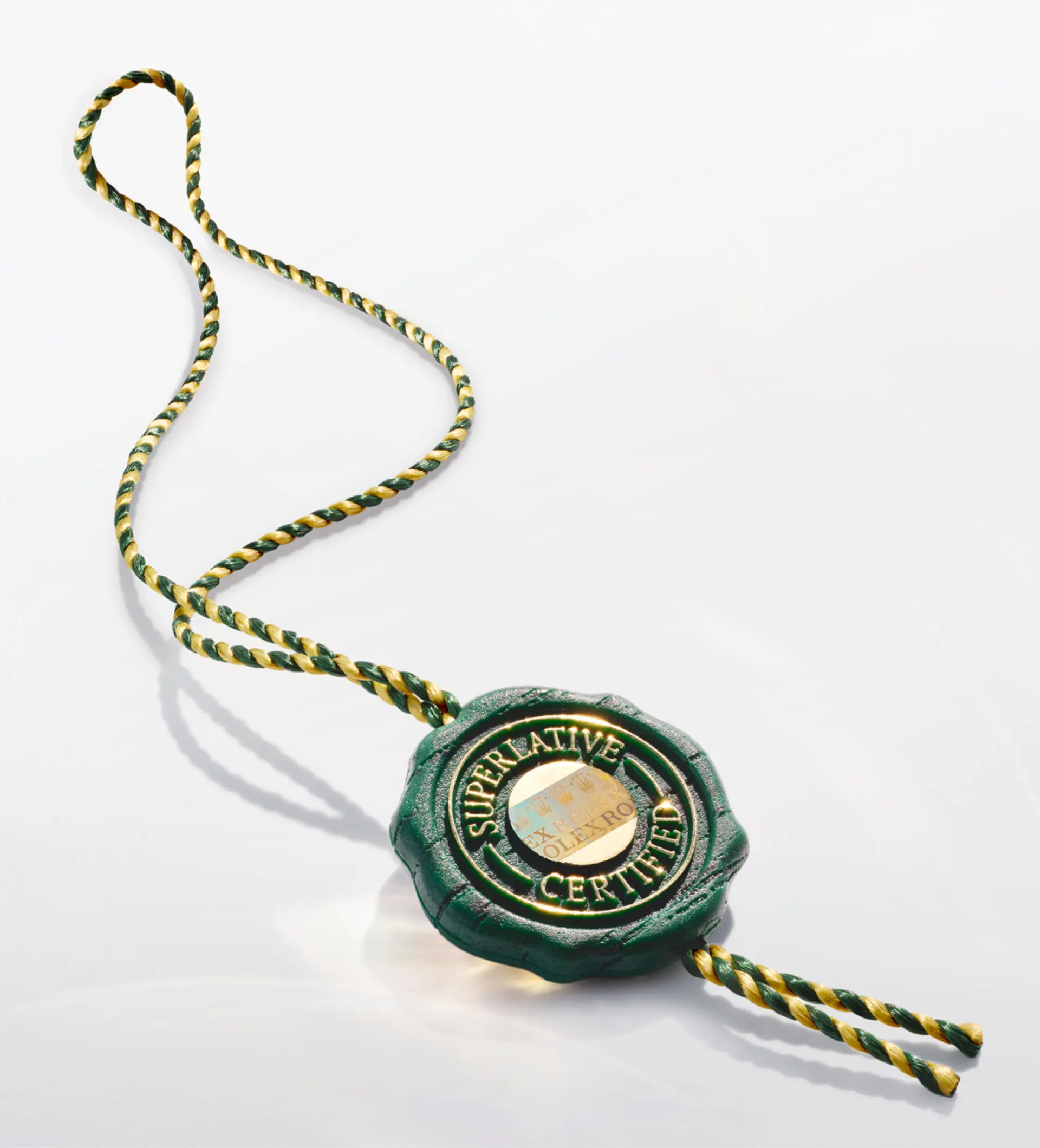 Rolex green seal emblem.