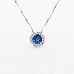 Blue Sapphire and Diamond Halo Pendant in 18K White Gold
