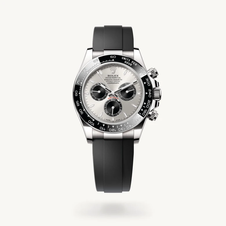 Rolex Cosmograph Daytona in 18 ct white gold with Steel and bright black dial, Black monobloc Cerachrom bezel in ceramic with moulded tachymetric scale bezel, and Flexible metal blades overmoulded with high-performance elastomer bracelet