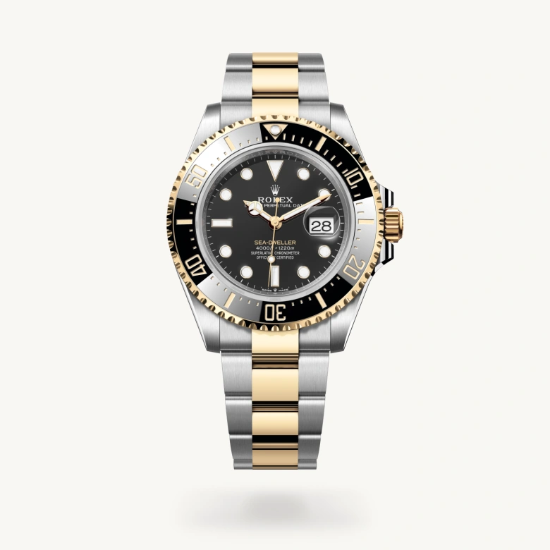 Rolex Sea-Dweller in Yellow Rolesor - combination of Oystersteel and yellow gold with Intense black dial, Unidirectional rotatable 60-minute graduated, scratch-resistant Cerachrom insert in black ceramic, numerals and graduations coated in gold bezel, and Yellow Rolesor - combination of Oystersteel and yellow gold bracelet