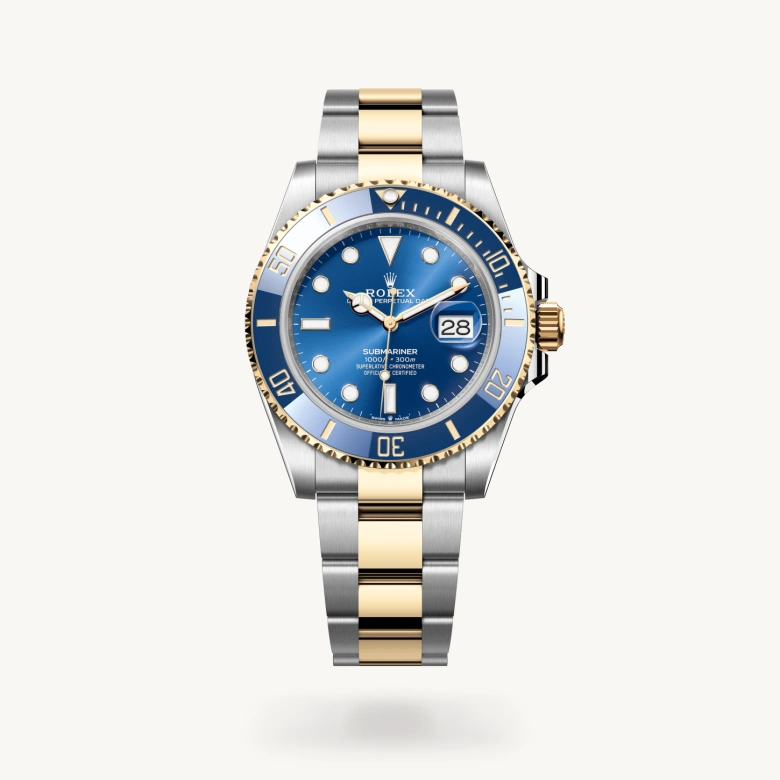 Rolex Submariner Date in Yellow Rolesor - combination of Oystersteel and yellow gold with Royal blue dial, Unidirectional rotatable 60-minute graduated, scratch-resistant Cerachrom insert in blue ceramic, numerals and graduations coated in gold bezel, and Yellow Rolesor - combination of Oystersteel and yellow gold bracelet
