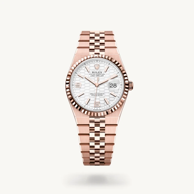 Rolex Land-Dweller 36 in 18 ct Everose gold with Intense white, honeycomb motif dial, Fluted bezel, and 18 ct Everose gold bracelet