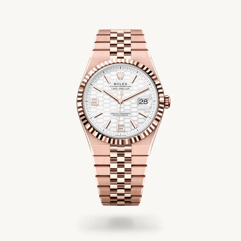 Rolex Land-Dweller 40 in 18 ct Everose gold with Intense white, honeycomb motif dial, Fluted bezel, and 18 ct Everose gold bracelet