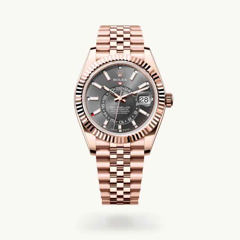 Rolex Sky-Dweller in 18 ct Everose gold with Slate dial, Fluted, bidirectional rotatable Rolex Ring Command bezel, and 18 ct Everose gold bracelet