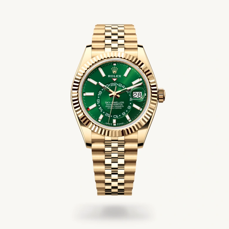 Rolex Sky-Dweller in 18 ct yellow gold with Bright green dial, Fluted, bidirectional rotatable Rolex Ring Command bezel, and 18 ct yellow gold bracelet
