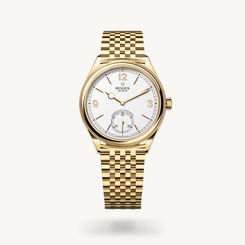 Rolex 1908 in 18 ct yellow gold with Intense white dial, Domed and fluted bezel, and 18 ct yellow gold bracelet